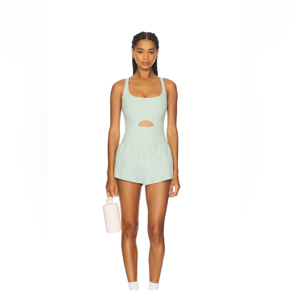Free People Movement Righteous Runsie size medium in color turquoise!